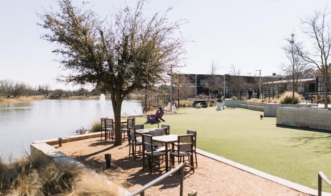 a park with tables and chairs